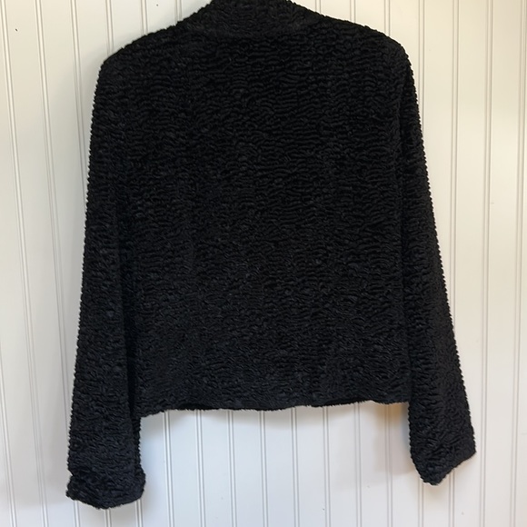 Black waist length jacket in a soft, poodle-like textured fabric. - Picture 2 of 5